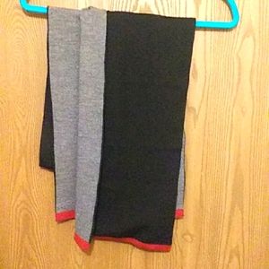 Tumi 100 % Extra Fine Italian Merino Wool Scarf. Black, Gray & Red Trim.